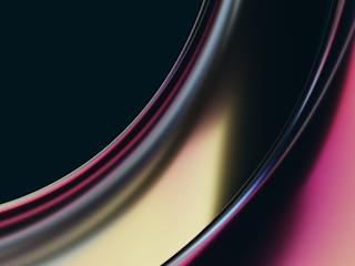 An abstract image featuring smooth, flowing curves in shades of pink, purple, gold, and black. The colors blend seamlessly, creating a metallic, reflective surface effect. The design has a modern, sleek aesthetic, evoking a sense of fluidity and movement. The background is dark, which accentuates the vibrant and dynamic nature of the curved shapes.