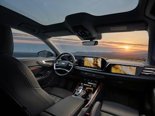 Interior of a car with a warm sunset glowing through the windows, creating a cozy atmosphere
