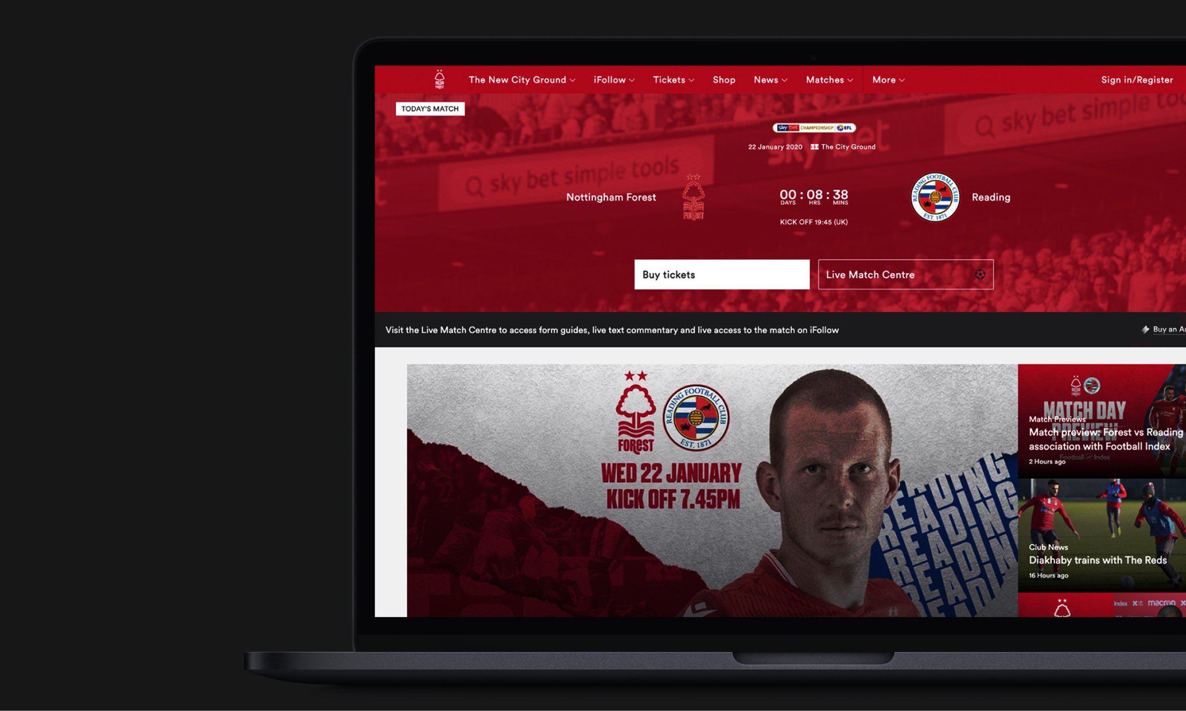 Image of a laptop displaying a football club's website with a match announcement for Nottingham Forest vs. Reading